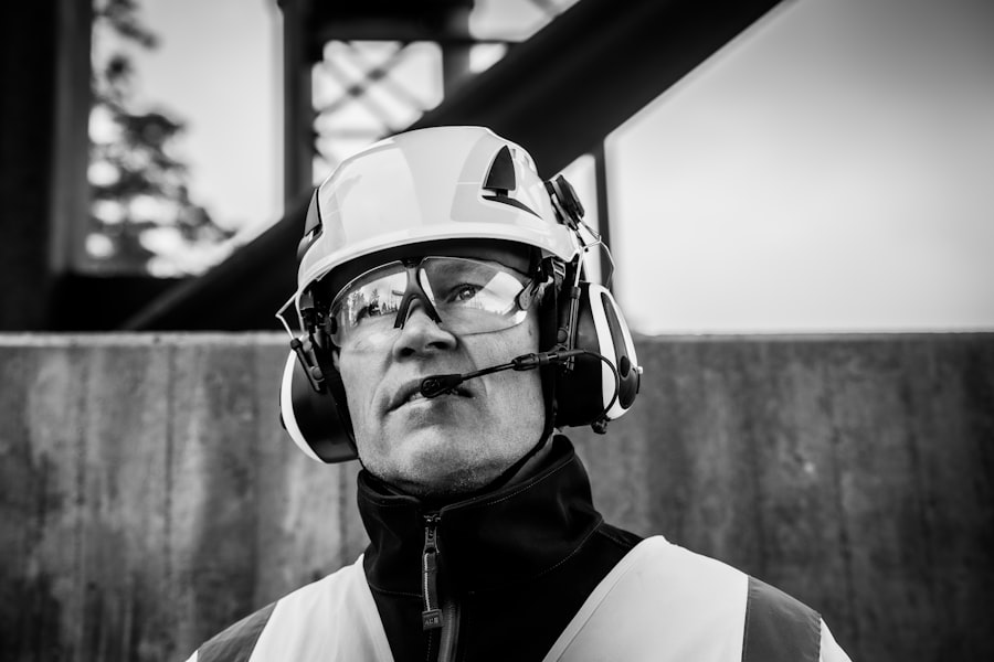 Industrial worker wearing safety helmet and goggles