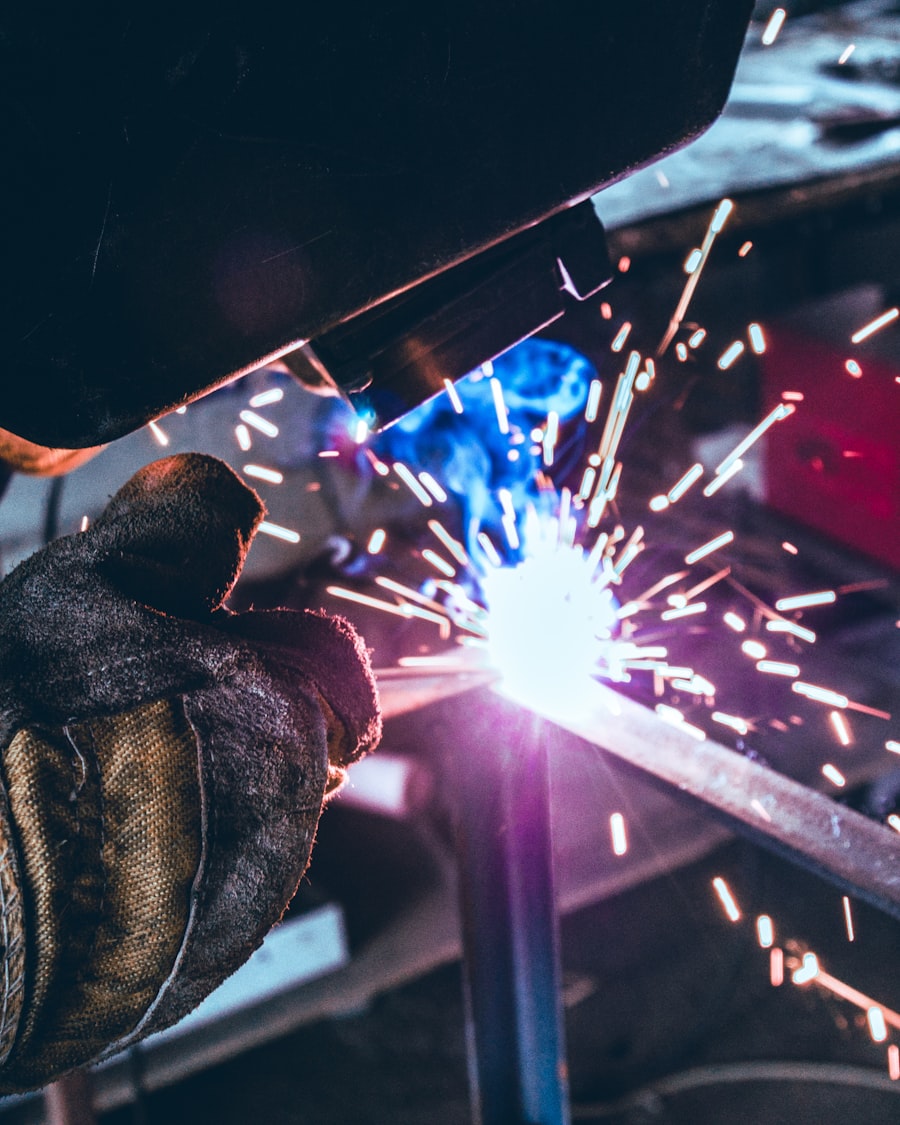 Welder working with bright sparks